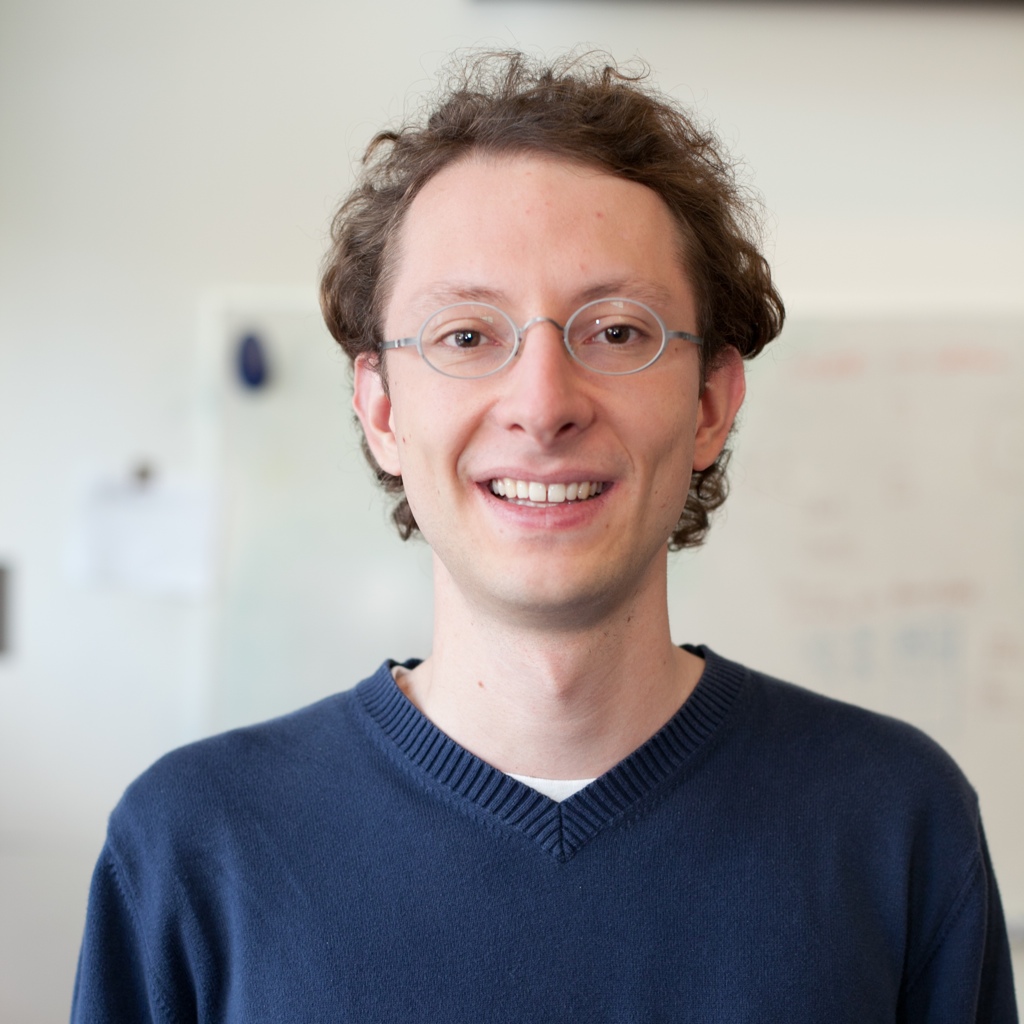 Professional headshot of Ludwig Schmidt, Organizer of the DCVLR competition from Stanford University.