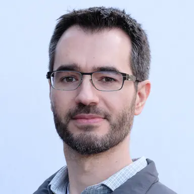 Professional headshot of Emmanouil Koukoumidis, Organizer of the DCVLR competition from Oumi.