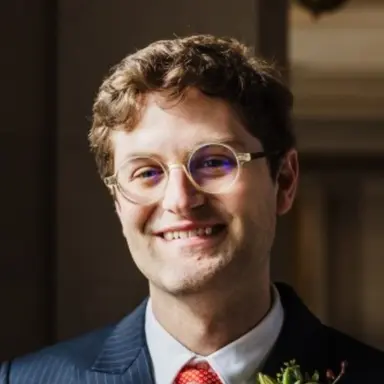 Professional headshot of Stefan Webb, Organizer of the DCVLR competition from Oumi.