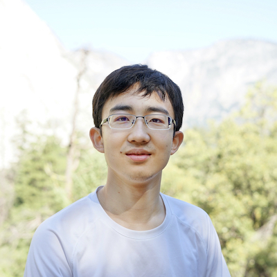 Professional headshot of Yuhui Zhang, Lead Organizer of the DCVLR competition from Stanford University.
